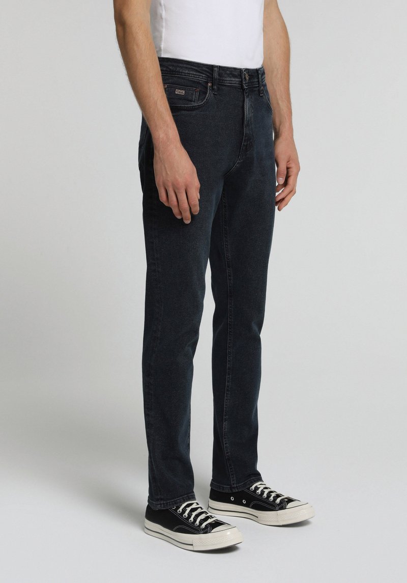 Imagine a Pantaloni Albastru-negru Slim Tapered Fit 067 Jack