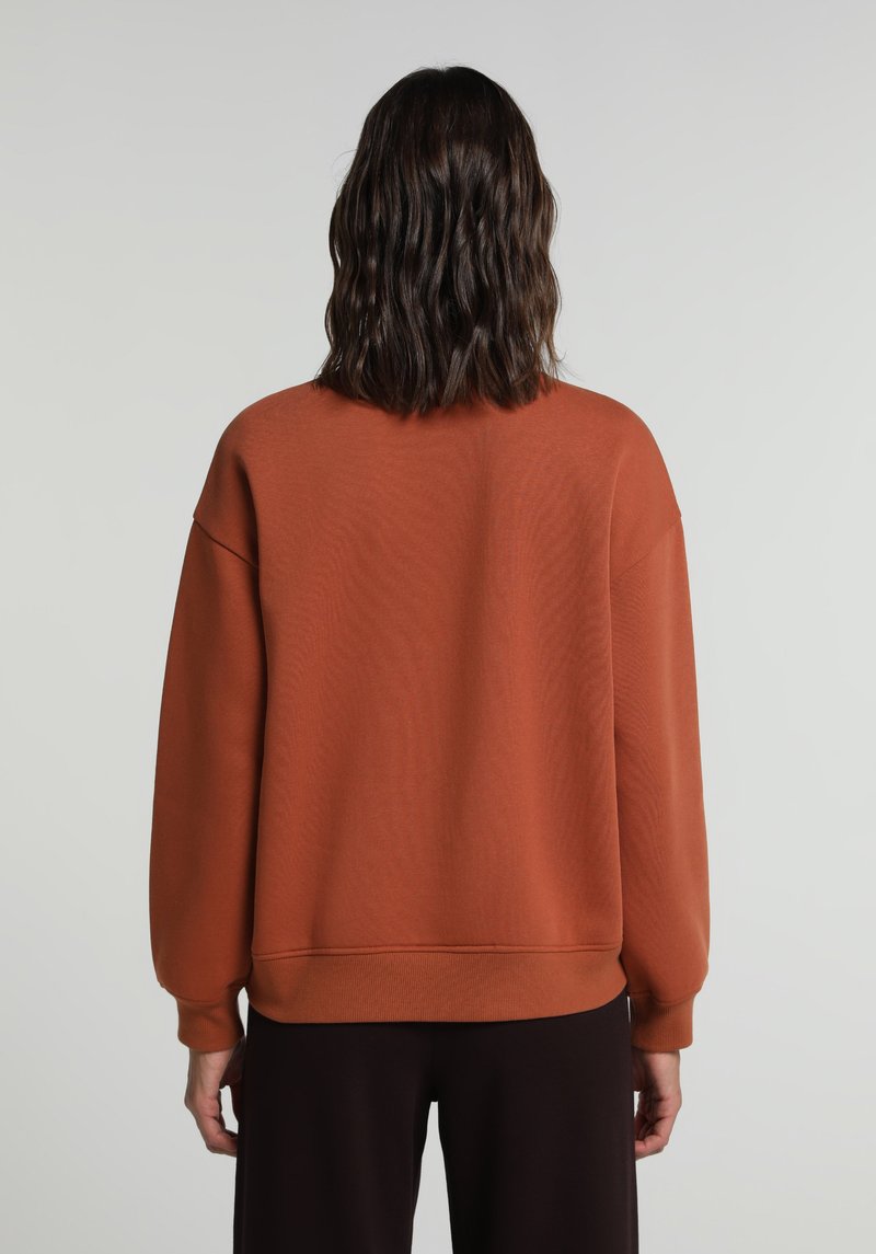 Imagine a Hanorac / Bluza De Dama Maro Regular Fit