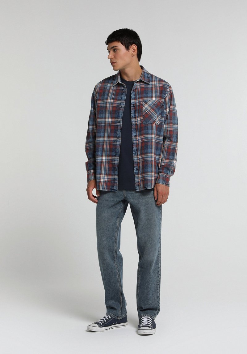 Imagine a Pantaloni  Indigo Mediu Loose Straight Fit 046 Marco