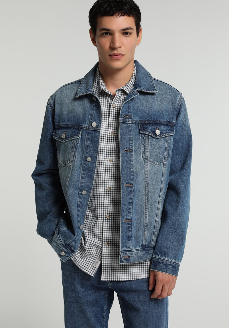 Imagine a Jacheta  Indigo Mediu Regular Fit 022 Nate