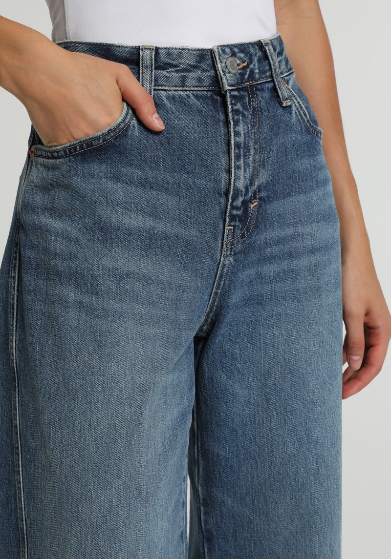 Imagine a Pantaloni  Indigo Mediu Baggy Fit 857 Hera