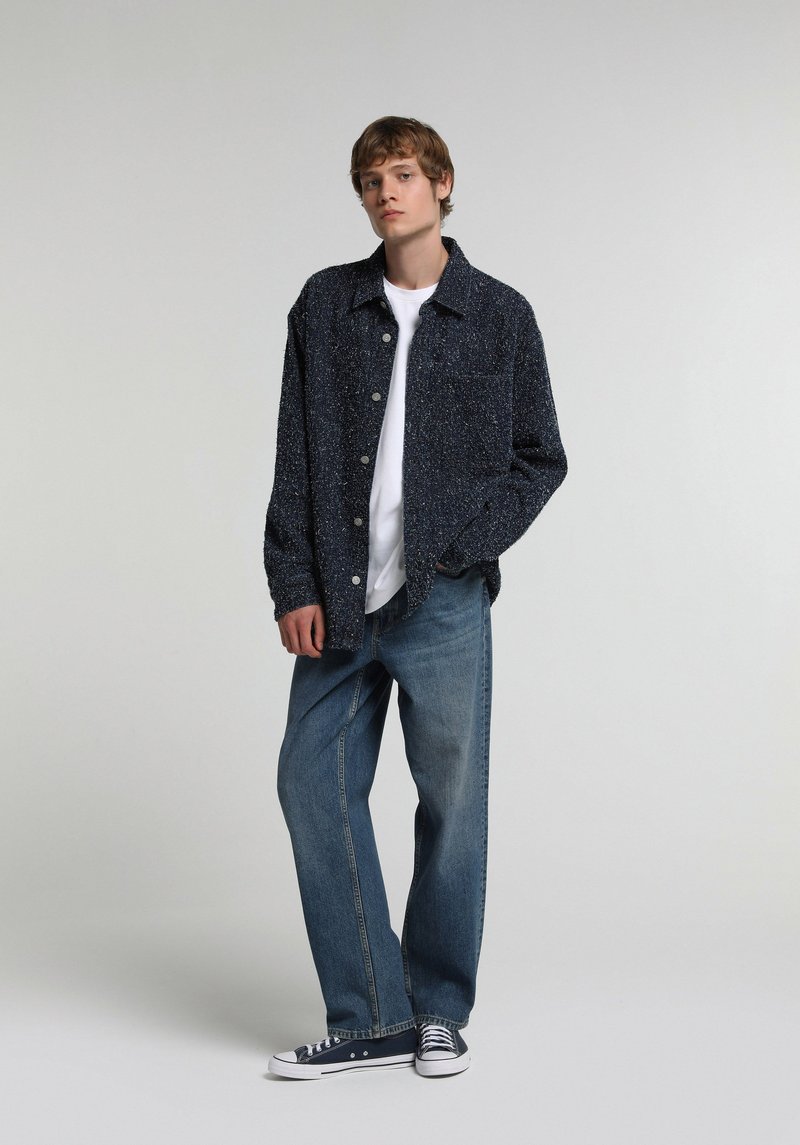Imagine a Pantaloni Indigo Mediu Baggy Fit 056 Ivan