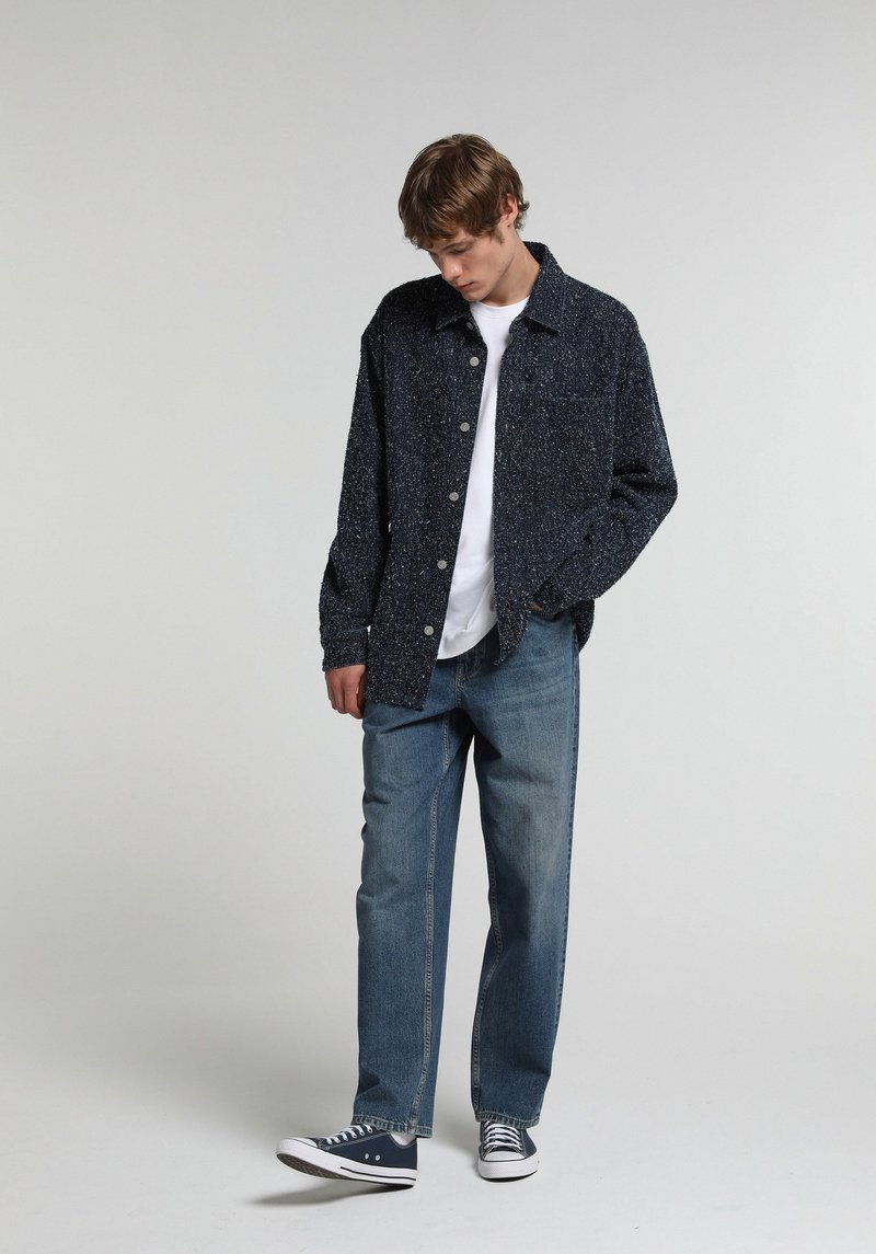 Imagine a Pantaloni Indigo Mediu Baggy Fit 056 Ivan