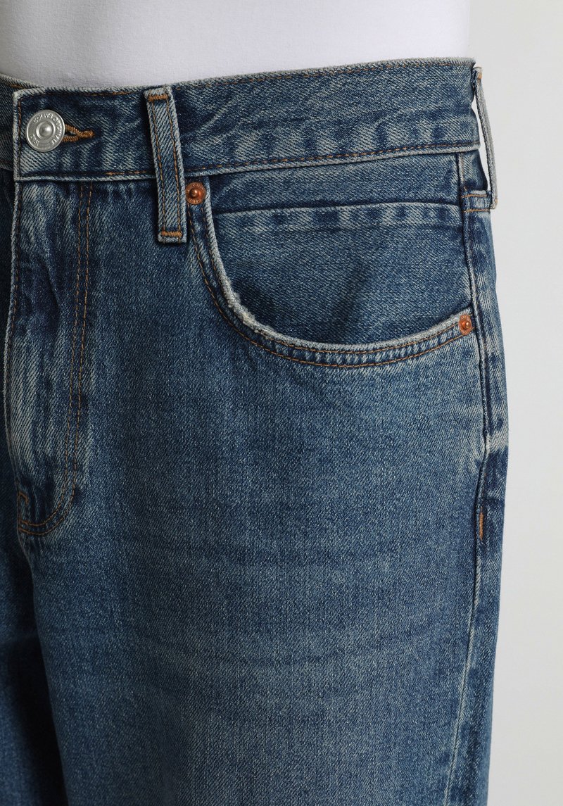 Imagine a Pantaloni  Indigo Mediu Baggy Fit 056 Ivan